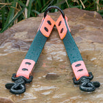 emerald and coral BioThane waterproof coupler with matte black hardware