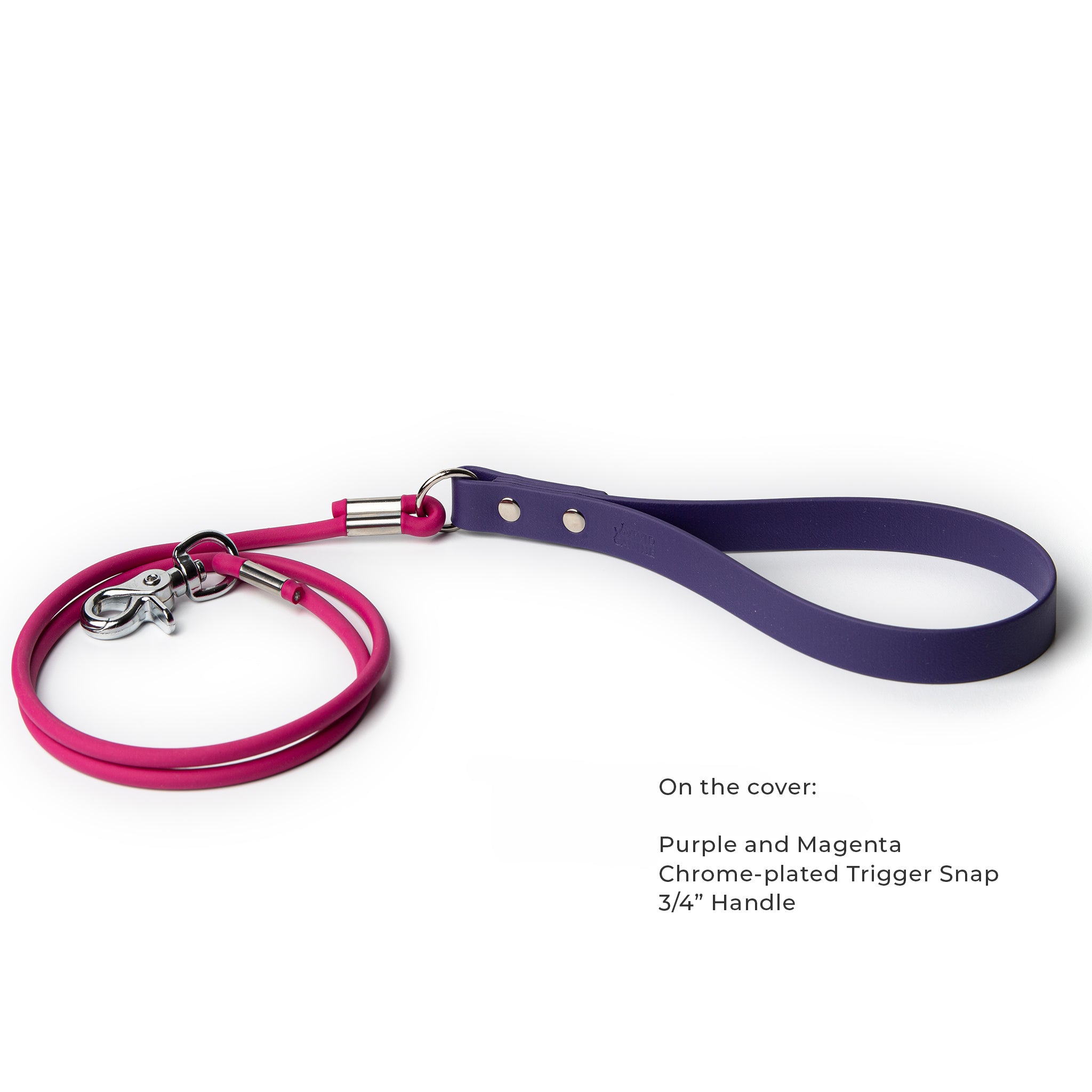 Close up of a biothane purple and magenta rolled dog leash with standard handle and chrome-plated trigger snap