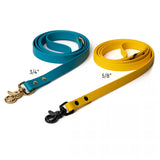 Waterproof BioThane standard leash in yellow and ocean blue in 5/8 and 3/4 widths with brass and matte black trigger snap hardware