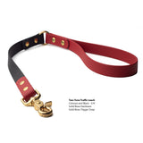 Two-Tone Biothane traffic leash in crimson and black with solid brass hardware and trigger snap with product details on a white background