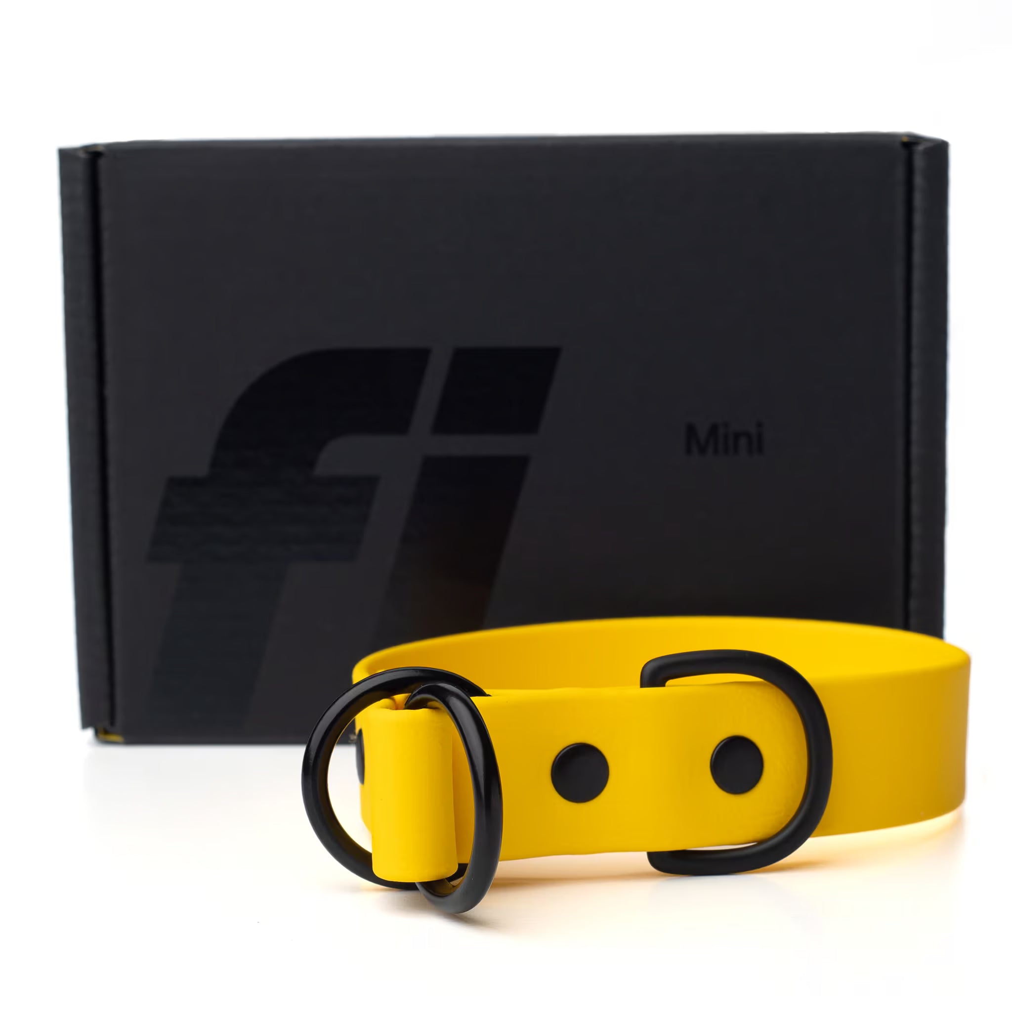 Fi Mini GPS collar bundle — black Fi box with yellow BioThane® slip dog collar on white background
