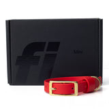 Fi Mini GPS collar bundle — black Fi box with red BioThane® buckle dog collar on white background