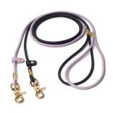 Vivid Canine waterproof BioThane rolled dog leash in black and lilac — durable, solid brass hardware, made in the USA