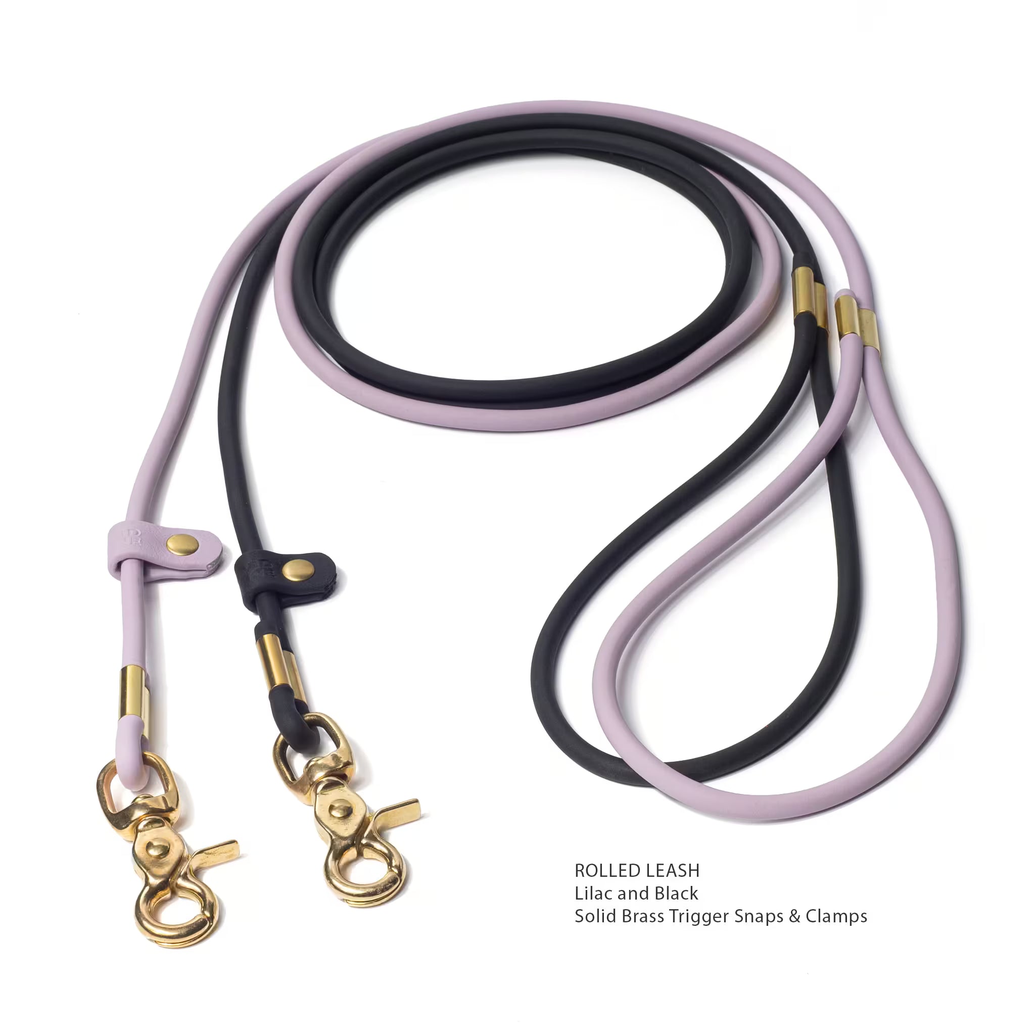 Vivid Canine waterproof BioThane rolled dog leash in black and lilac with product color details — solid brass hardware, made in the USA