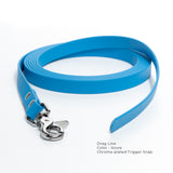 An azure blue biothane drag line with a chrome plated trigger snap coiled on a white background.