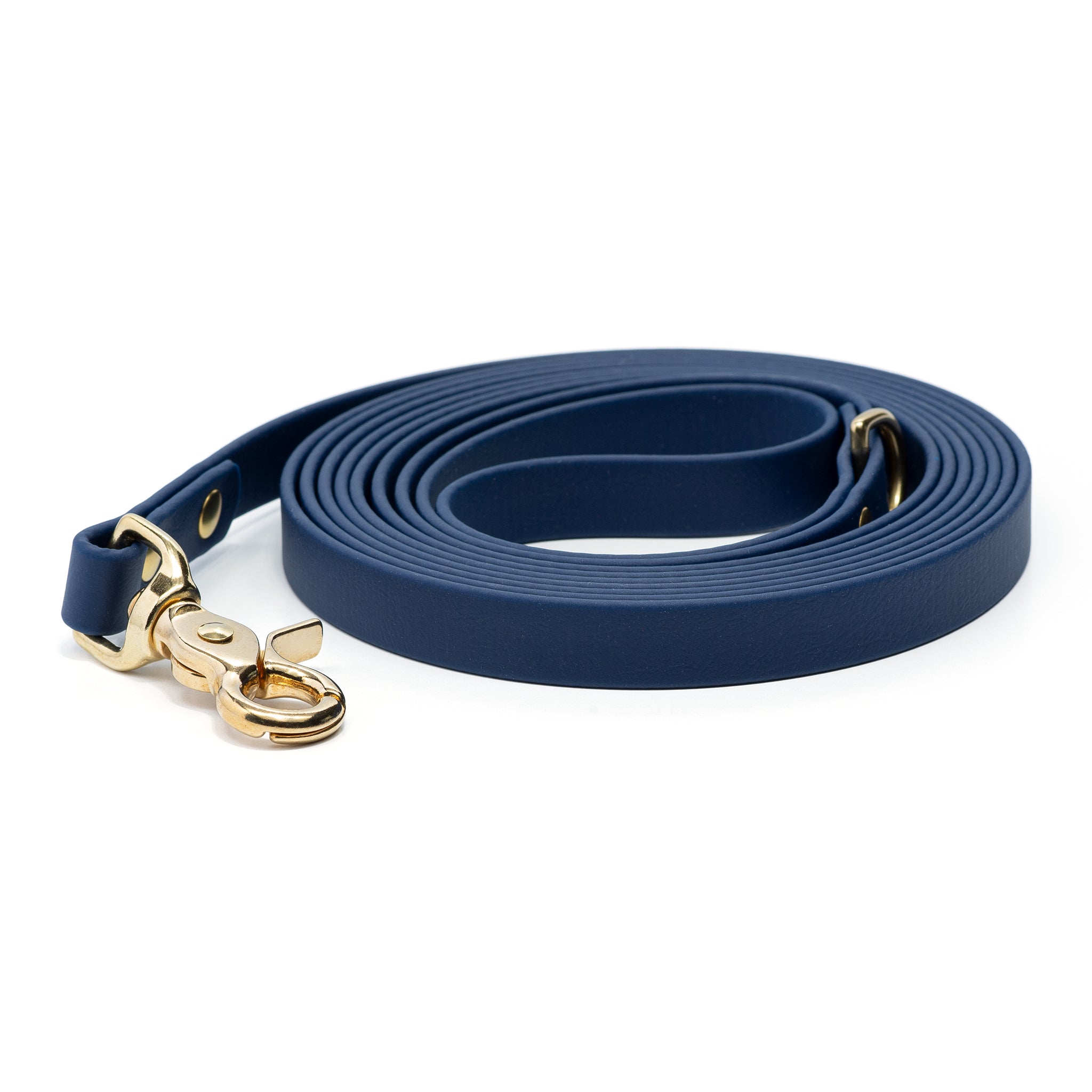 A deep-sea blue biothane lone line with an O-ring and solid brass trigger snap  coiled on a white background.