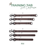 Comparison of BioThane training tab sizes with a measuring tape on a white background