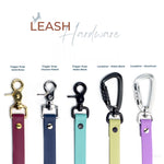BioThane leash hardware in brass, chrome, and matte black finishes on white background