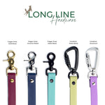 BioThane leash hardware in brass, chrome, and matte black finishes on a white background