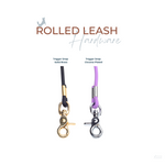 Two rolled leashes with trigger snaps with product details on a white background 