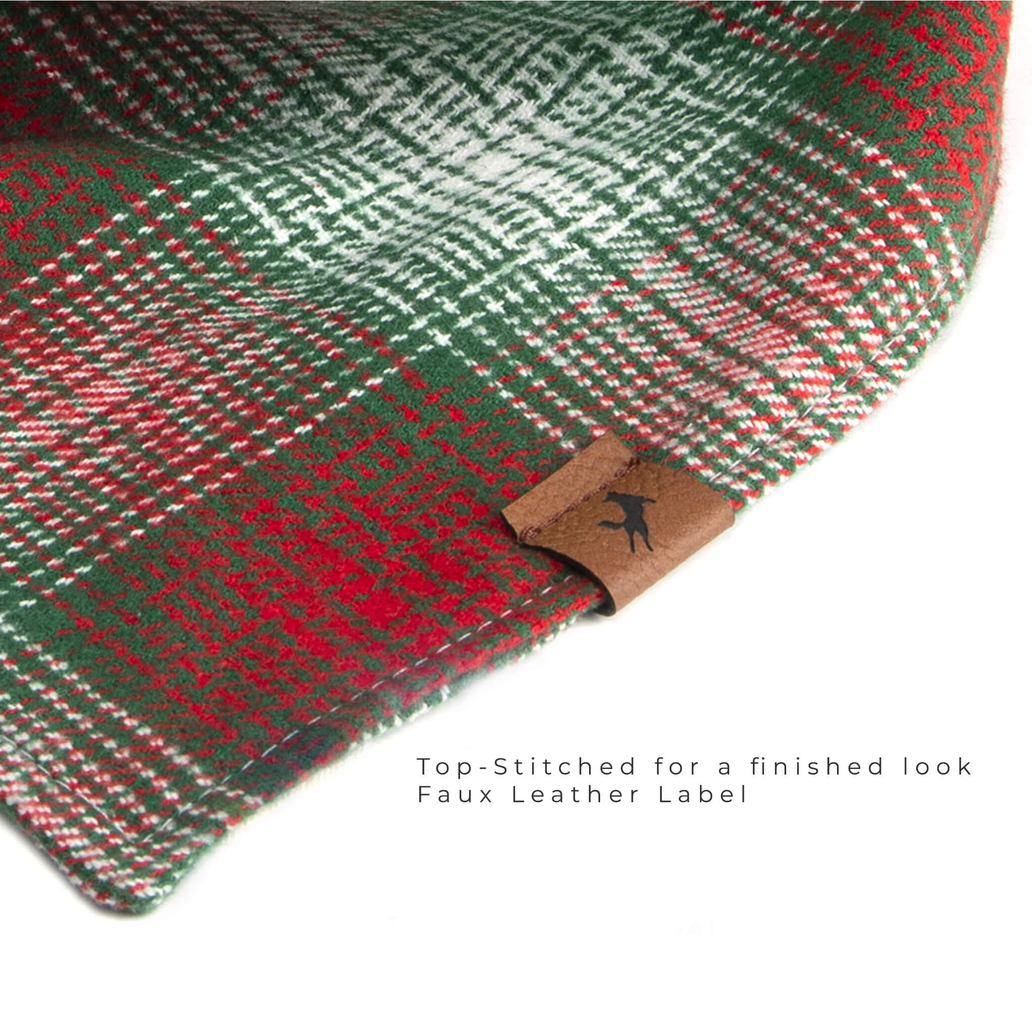 Vivid Canine Blurred Red Plaid dog bandana up-close showing faux leather label and top stitching detail