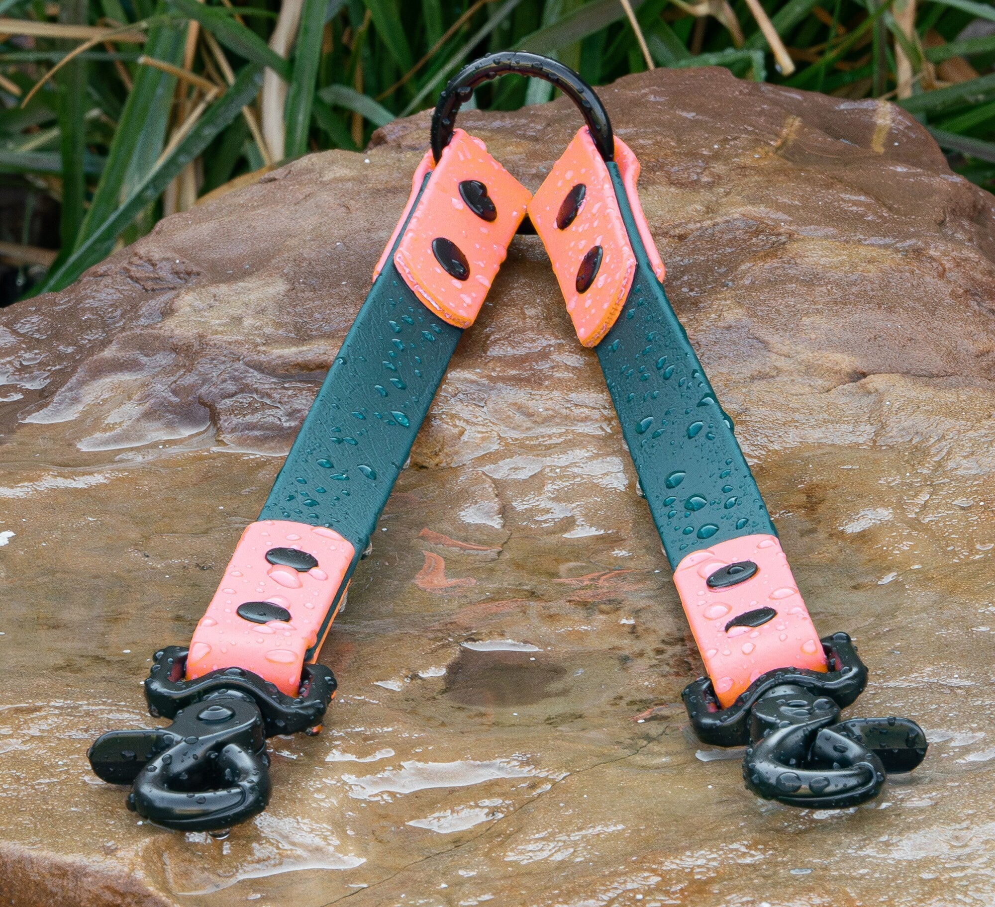 emerald and coral BioThane waterproof coupler with matte black hardware