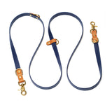 two tone hands free leash in deep sea blue color with caramel color accents with solid brass hardware