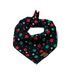 Christmas dog bandana with red and green paw prints