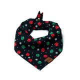 Christmas dog bandana with red and green paw prints